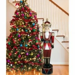 Fraser Hill Farm 6-Ft. Life-Size Jeweled Nutcracker Greeter With Staff And 22 Long-Lasting LED Lights